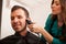 Young man in a hair salon