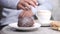 young man hand pick cookies and drinking tea