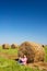 Young man on the harvested field