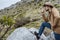 Young man in Hat starting an adventure in the mountain in Montenegro