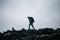 Young man hikes through rough iceland terrain