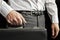 Young man holding a briefcase