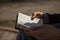 Young man holding and reading holy bible