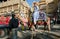 Young man in indian dress rides the camel on the street