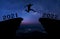 A young man jump between 2021 and 2022 years over night sky with stars and through on the gap of hill  silhouette evening colorful