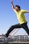 Young man jumping freely with blur movement