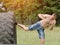 Young man is kicked a foot in a tire. Workout