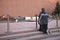 A young man knelt before the eternal flame at the grave of the Unknown soldier-a monument to all those who died in the great Patri