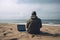 Young man with laptop computer on a beach. Freelance work concept