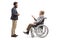 Young man listening to an elderly gentleman sitting in a wheelchair and talking