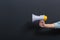 Young man with loudspeaker