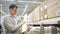 Young man in lumber department at hardware store