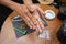 Young man making cigarettes with medical marijuana