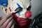 Young man making up himself as an evil clown