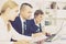 Young man manager working with concentrated colleagues in office