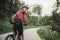 Young Man on Mountain Bicycle on Forest Road.