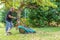 Young Man Mowing the lawn