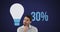 Young man next to light bulb shape and numbers filling up with colour 4k