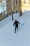 Young man participates in winter orienteering training in urban conditions