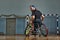 young man with a physical disability playing tennis on wheelchair on tennis court