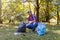 Young man picking up litter in his local park