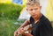 Young man plaing by guitar