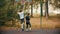Young man playing basketball on the sports ground with friend - dribbling, avoiding his opponent and throwing a ball -