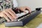 Young man playing an electronic keyboard