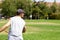 Young man playing with flying ring at park