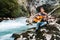 Young man playing guitar sitting on the bank of a mountain river on a background of rocks and forest. Handsome hippie style