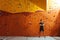 Young man posing near climbing wall