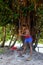 Young man pounding kava roots in Lavena village, Taveuni Island, Fiji