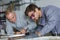 Young man in professional training to become plumber