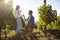 Young man proposing girlfriend at vineyard