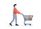 Young man purchaser carrying supermarket shopping cart full of groceries. Male buyer pushing grocery store basket