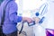 Young man refuelling a car at a petrol station