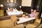 Young man relaxing in an Asian-styled hotel room