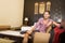 Young man relaxing in an Asian-styled hotel room