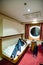 Young man relaxing in boat cabin