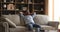 Young man relaxing on cozy sofa inside modern living room