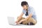 Young man relaxing on floor and learning language