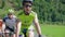 Young man riding bicycle with helmet and glasses