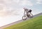 Young man riding bicycle on highway