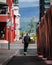 Young man riding an electric scooter in Reykjavik downtown, Iceland.