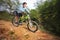 A young man riding a mountain bike