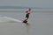 Young Man Riding a Wakeboard in Maine`s Casco Bay