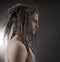 Young man\'s portrait. Stylish handsome Guy with Dreadlocks