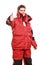 Young man sailor in red wind jacket. Sailing.