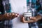 young man saving coins in a jar white sited