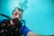 Young man scuba diver making selfie